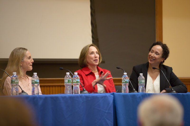 Wendy Whalen, Arlene Shuler and Virginiia Johnson sit a table in front of an audience